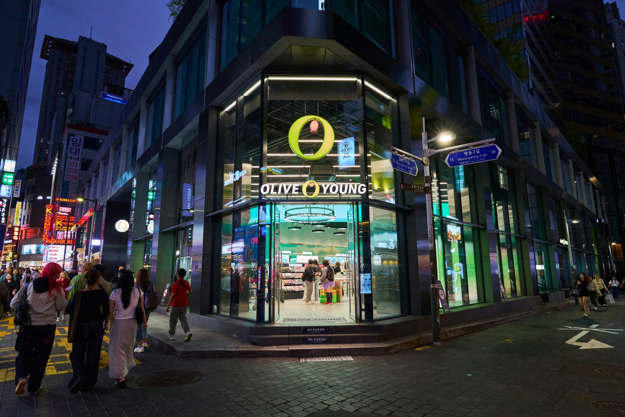 Olive Young store in Myeongdong Seoul at night Korean beauty retailer